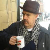 Phil Jupitas - English stand-up and improv comedian, actor, performance poet, cartoonist and podcaster.